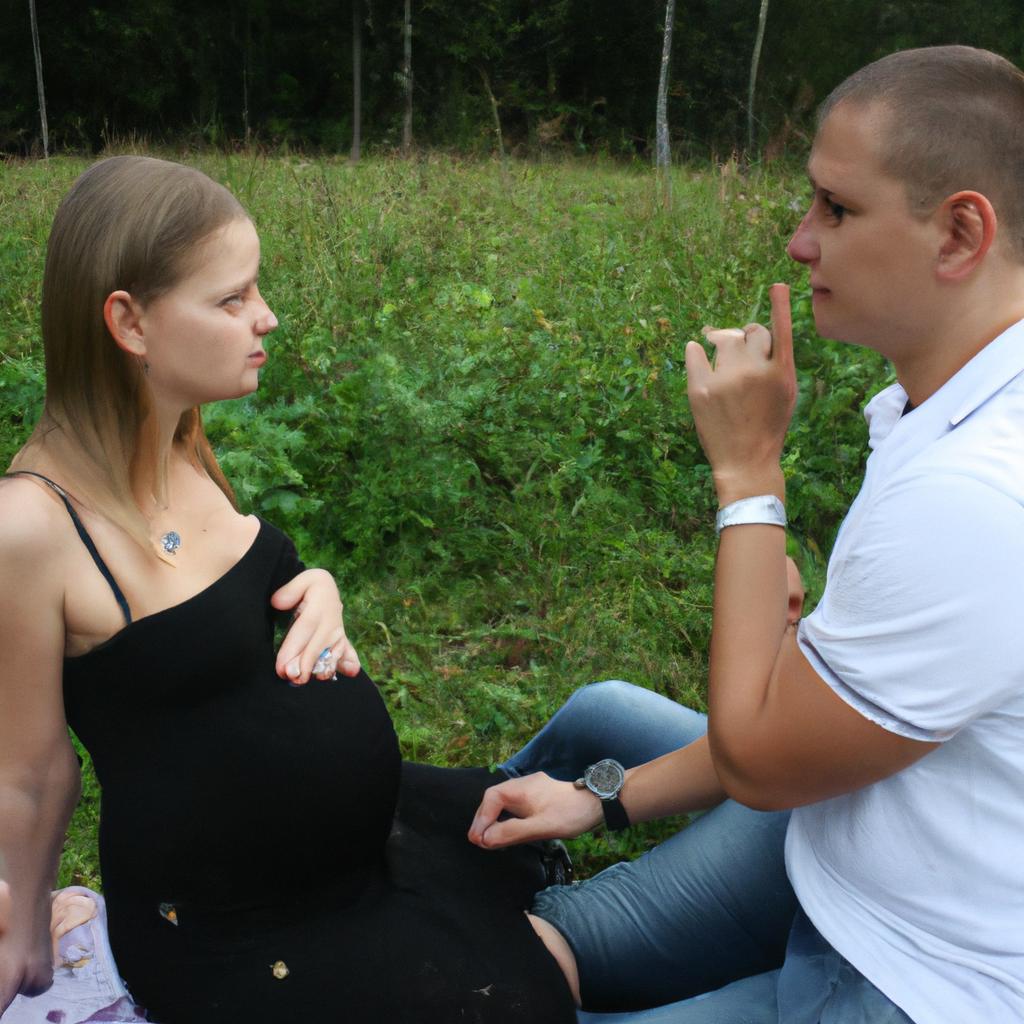 Man and woman discussing pregnancy