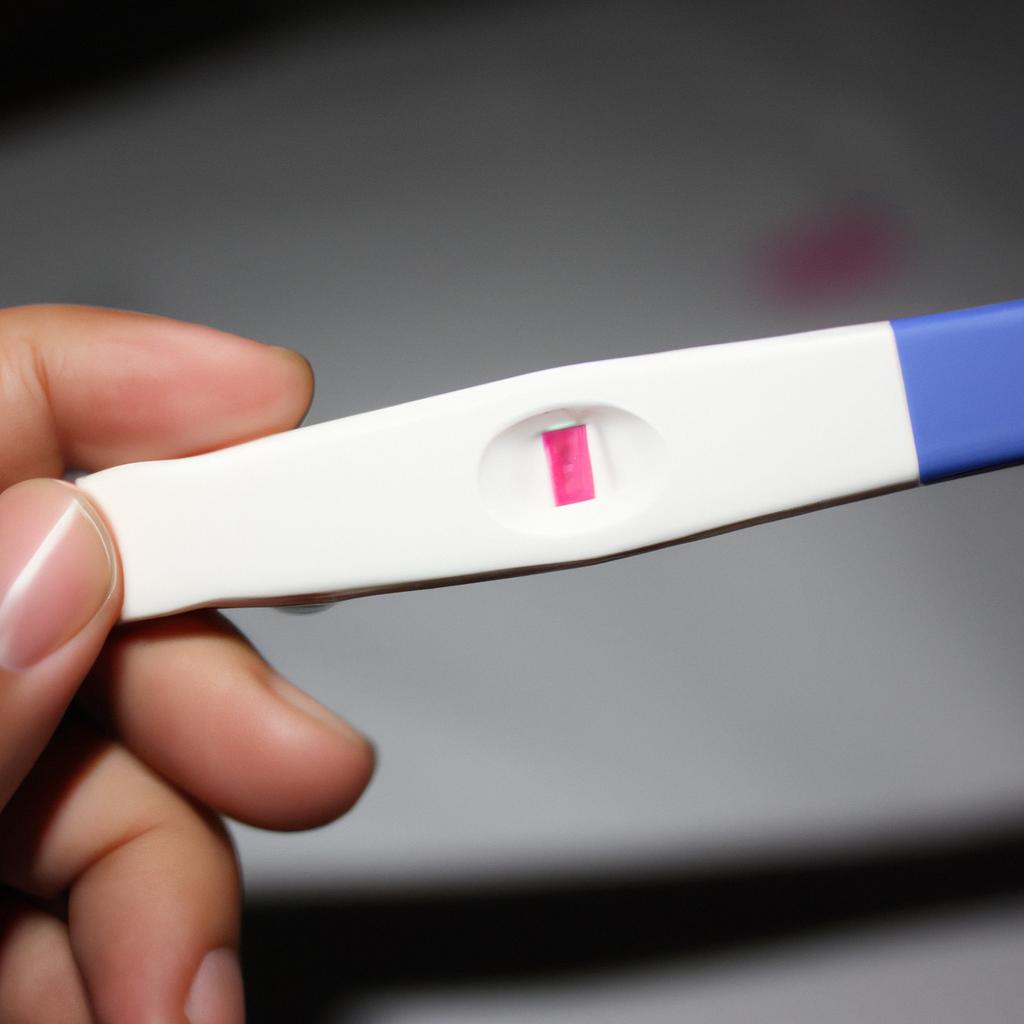 Person holding a pregnancy test